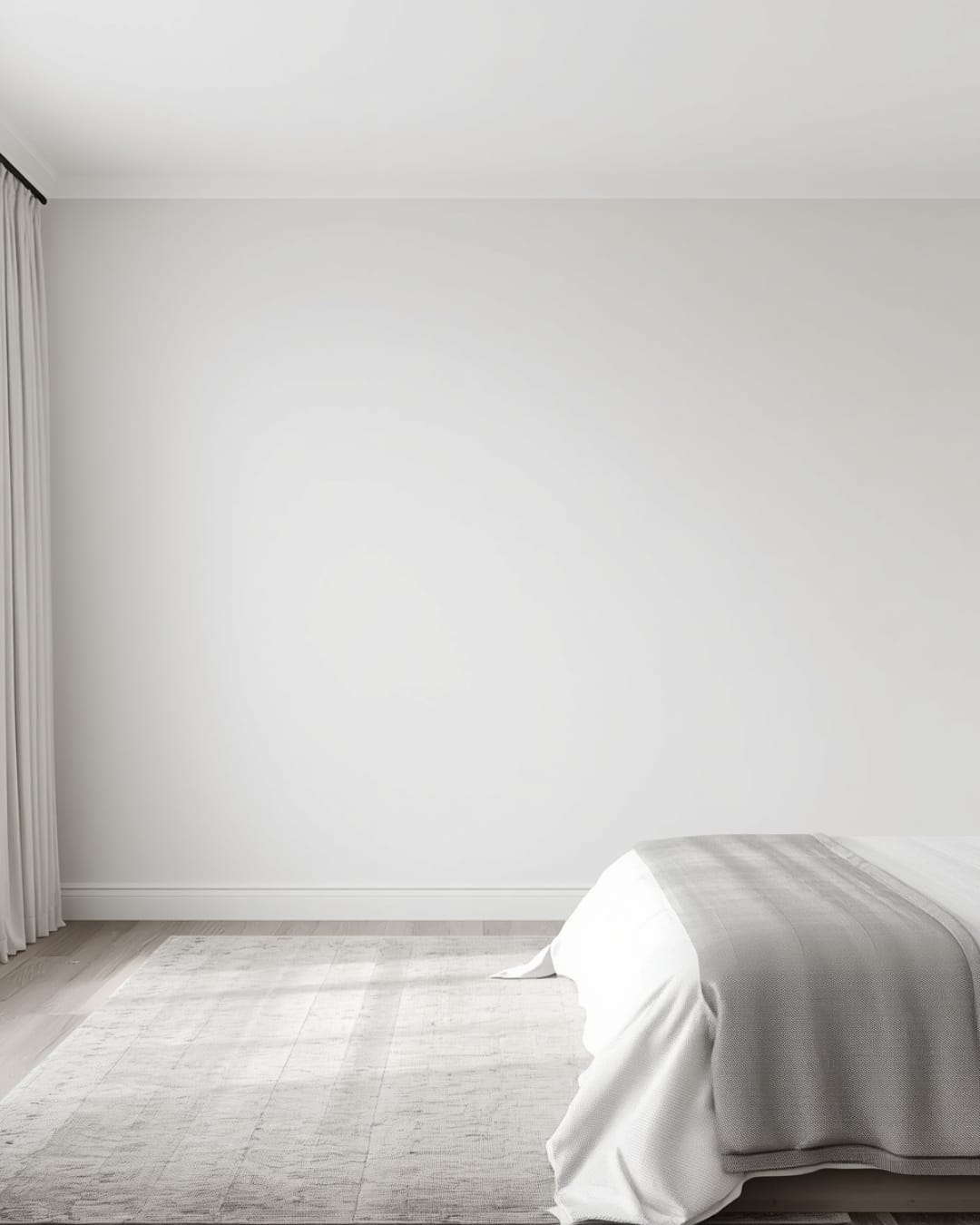Master bedroom wall before wardrobe installation, showing open wall area beside the bed